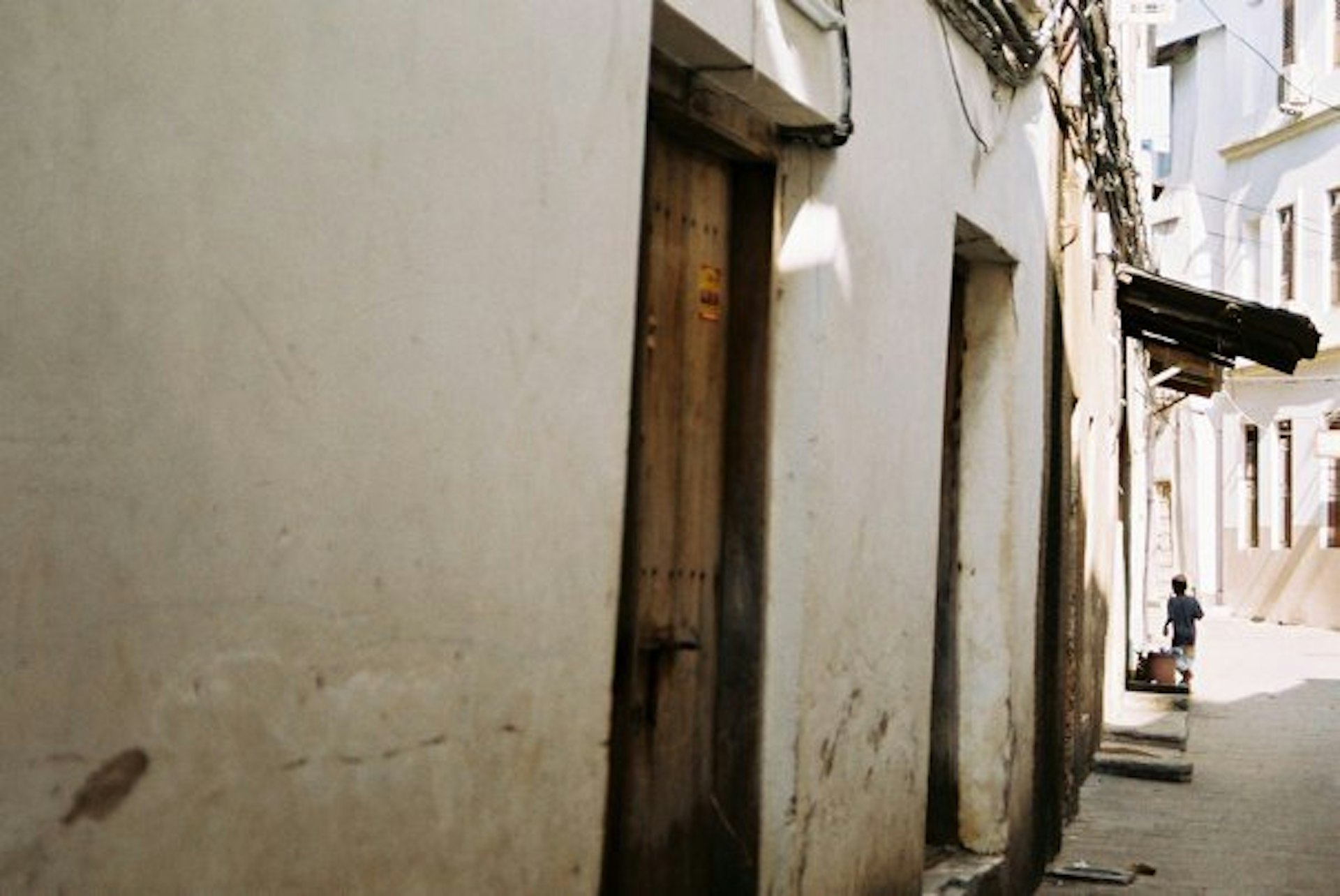A boy in an alley in Tanzania