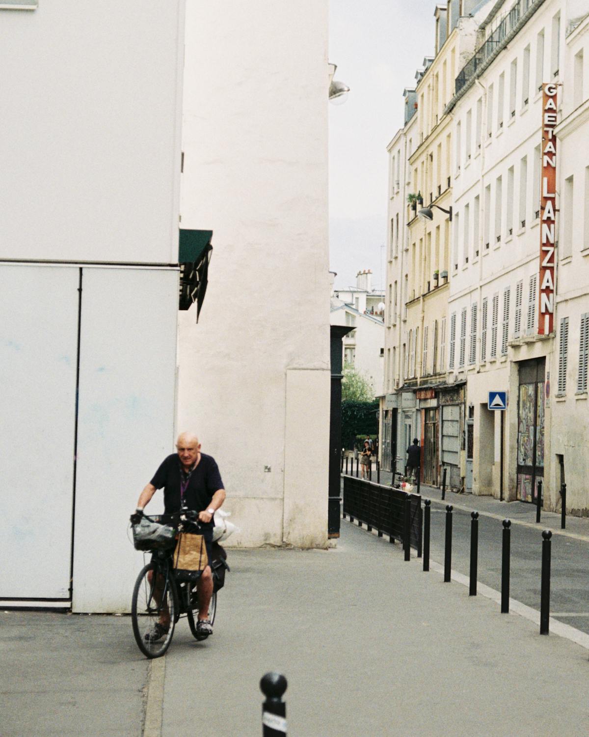 A man on a bicycle in Paris