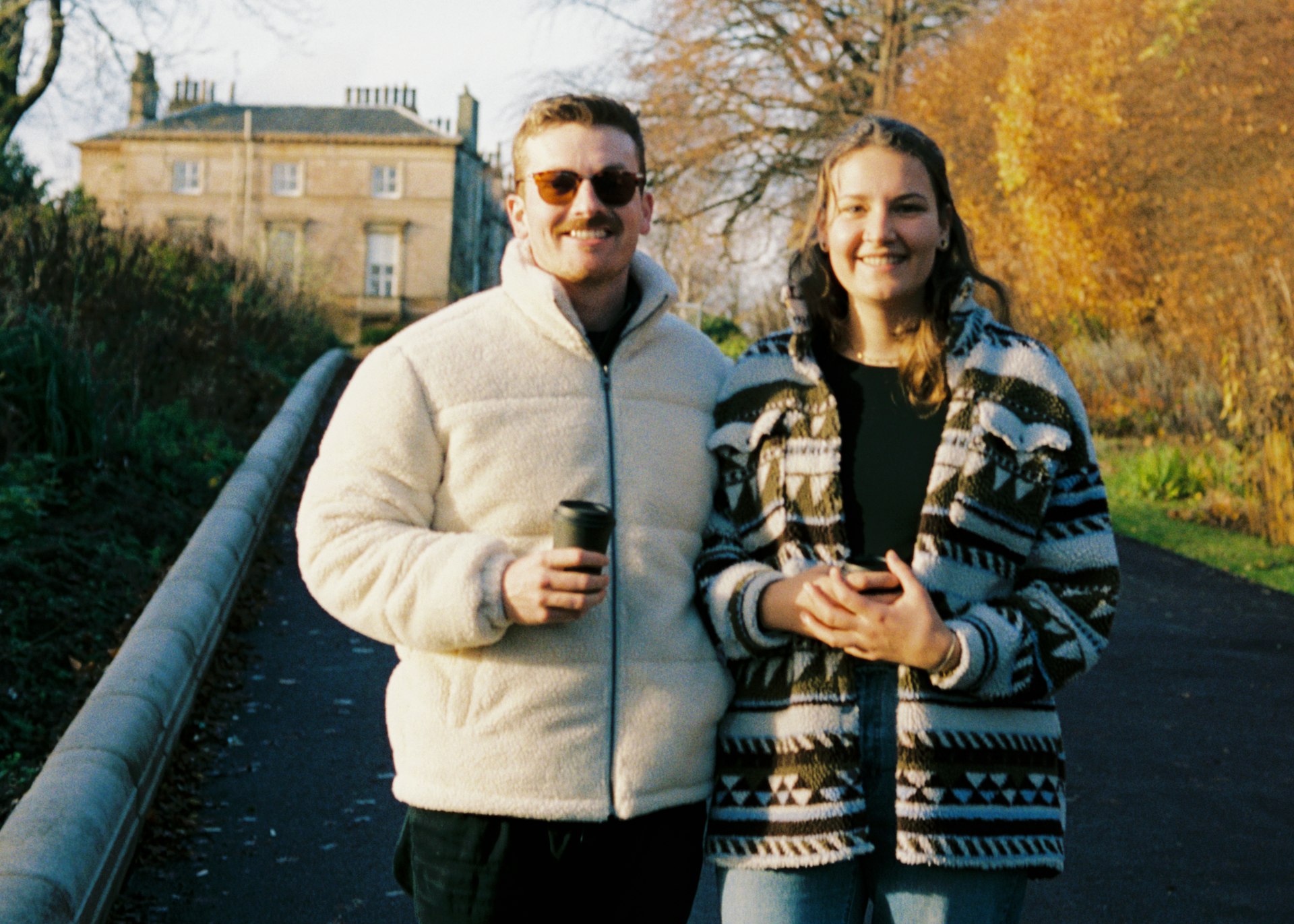 A couple standing in a park