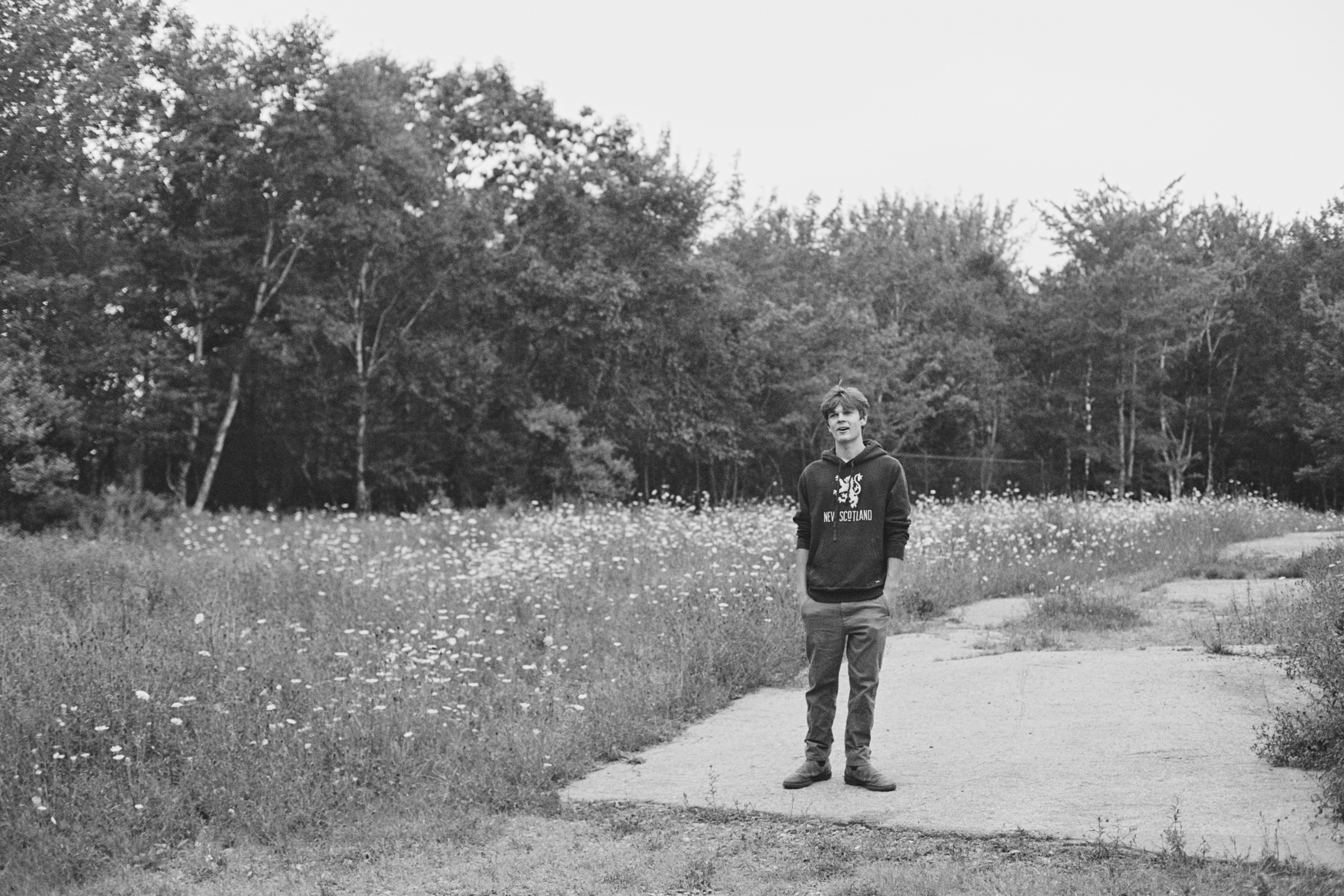 Jesse standing on a path