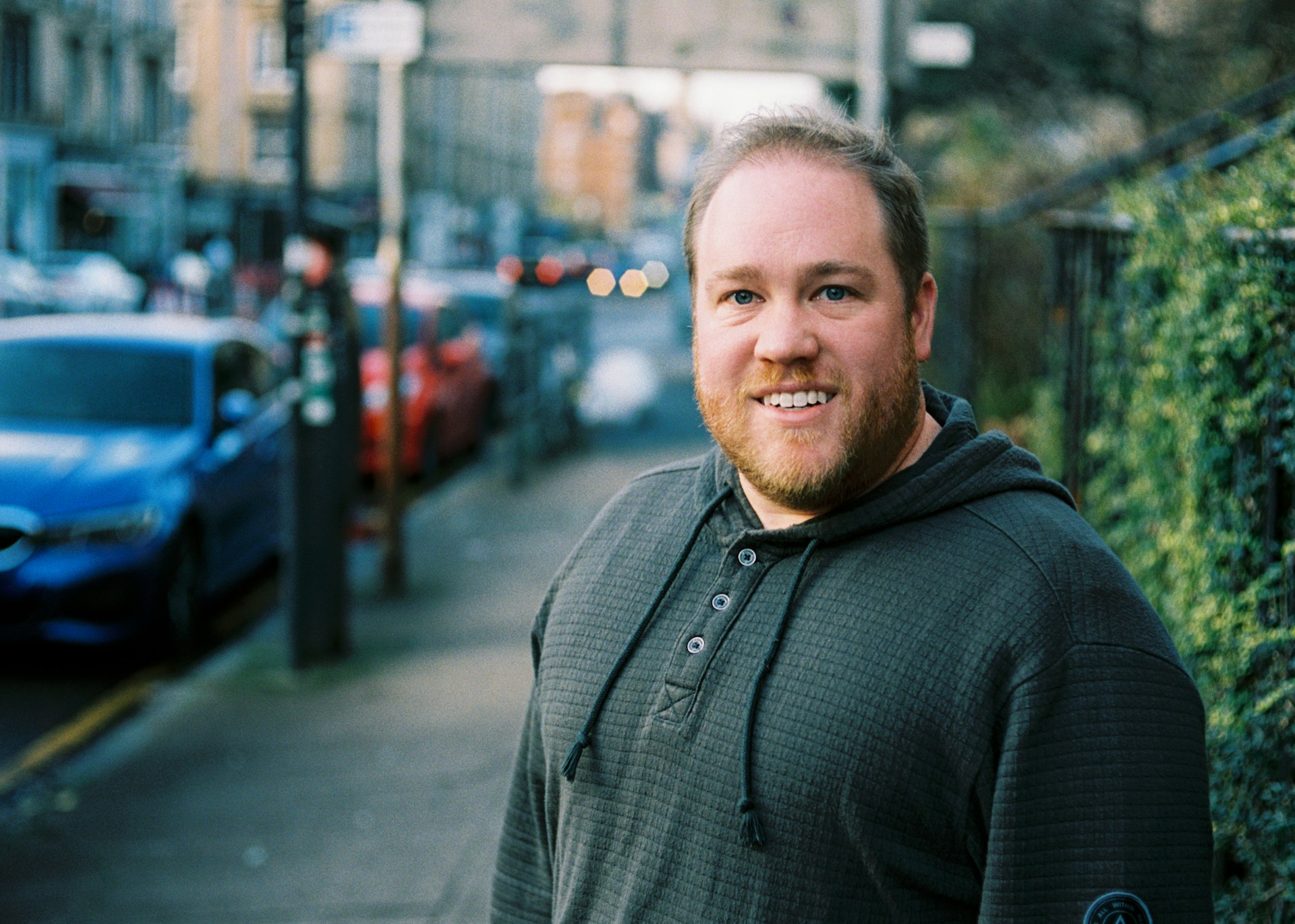 A man standing on the sidewalk