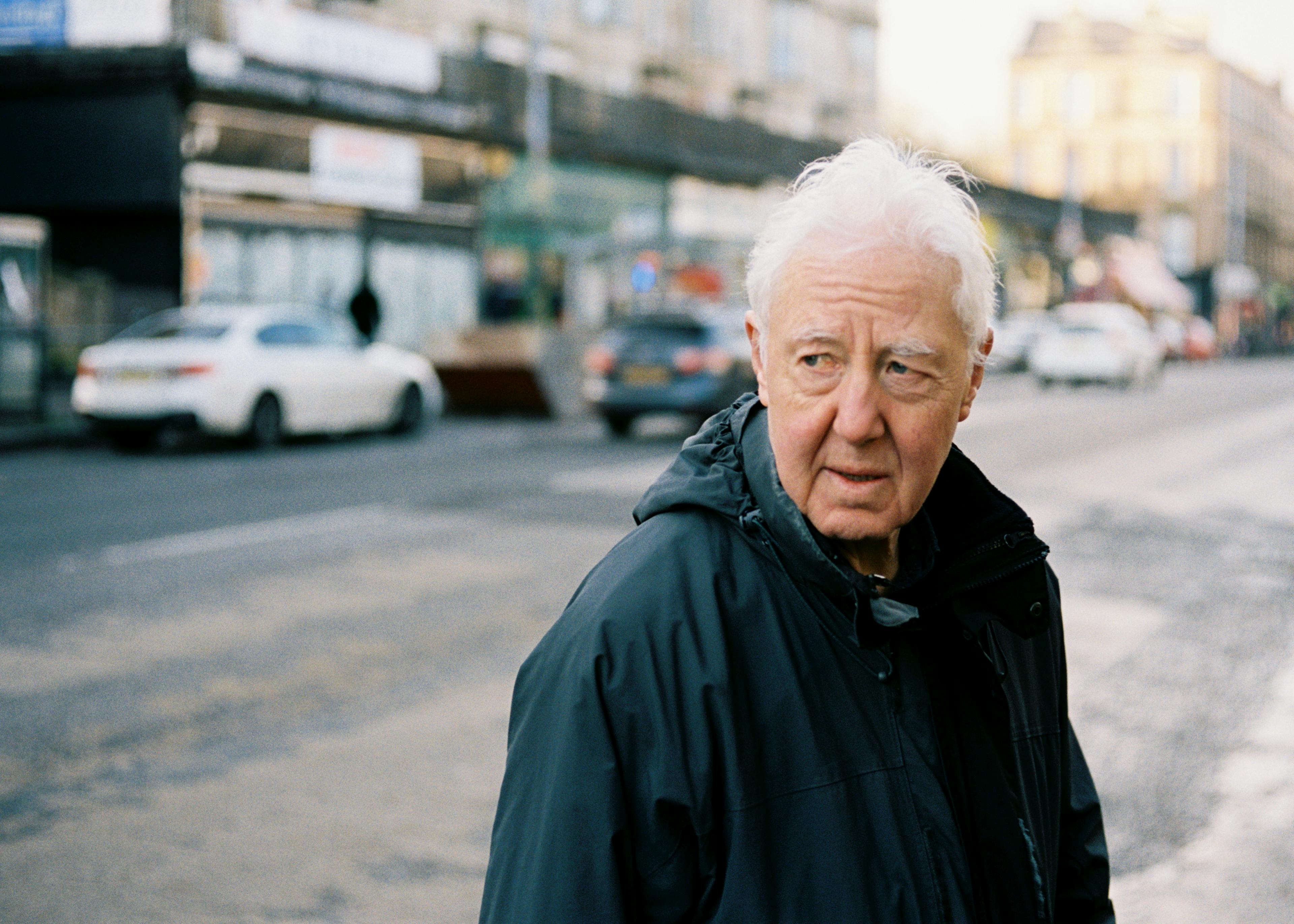 A man standing on the sidewalk
