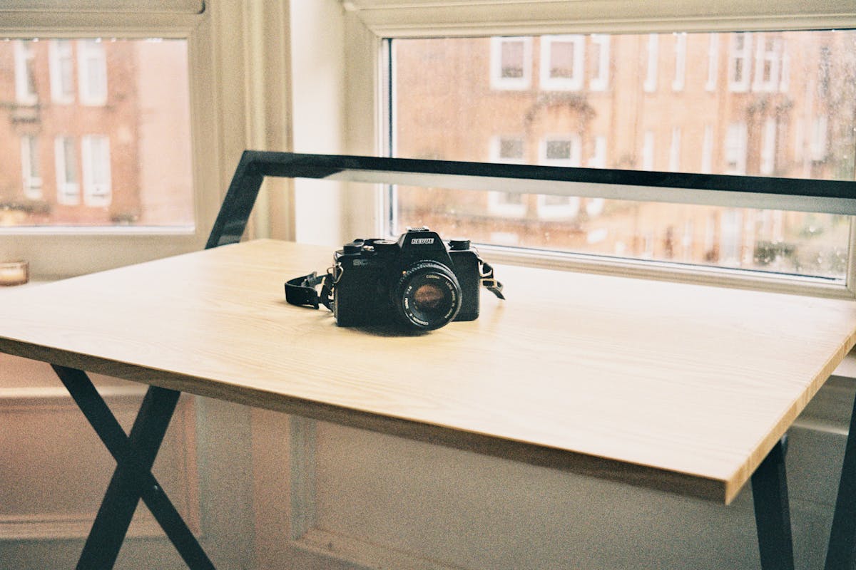 A 35mm SLR camera sitting on a table