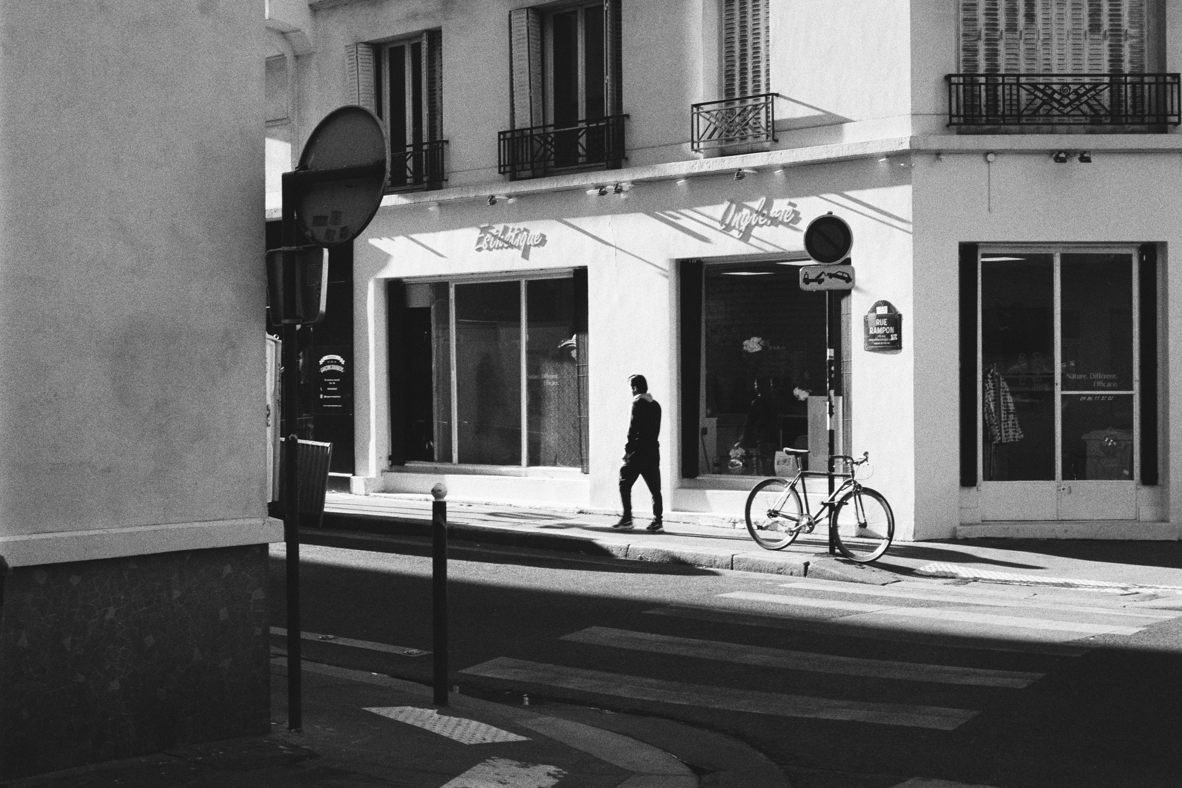 A man walking down the sidewalk