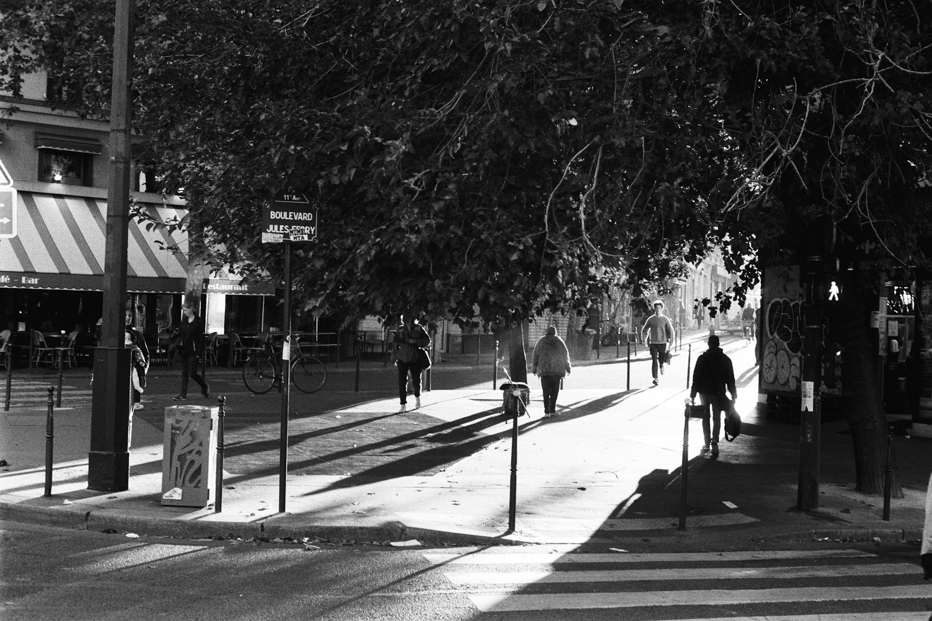 a man running on the sidewalk