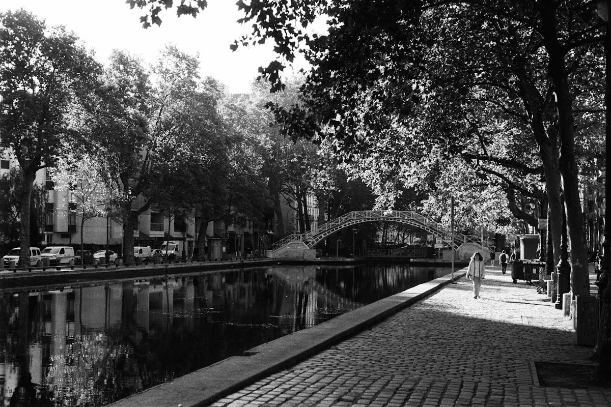 A woman walking along the canal