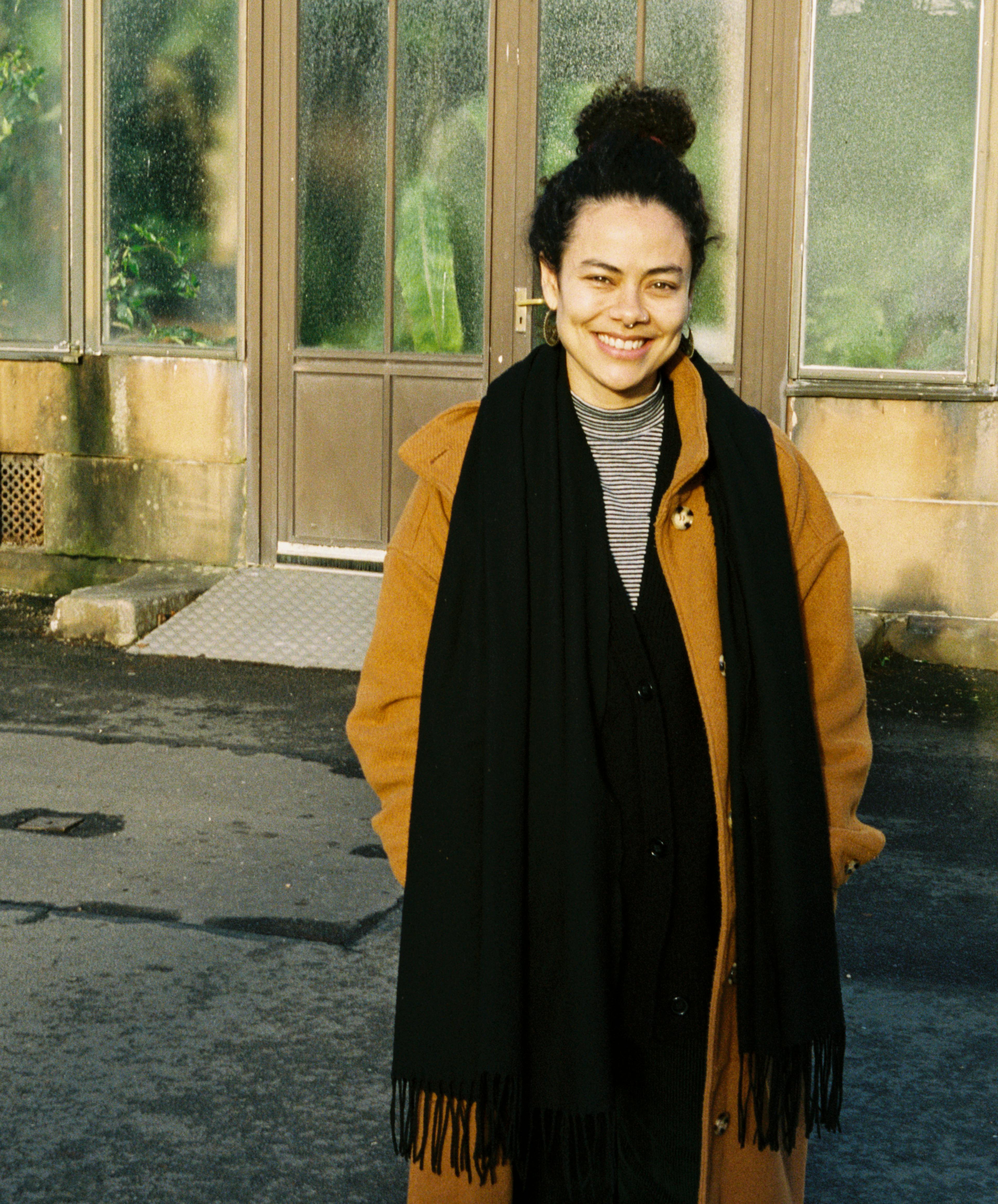 A woman standing in the sun